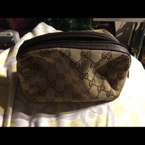 Authentic Gucci makeup bag or small clutch.